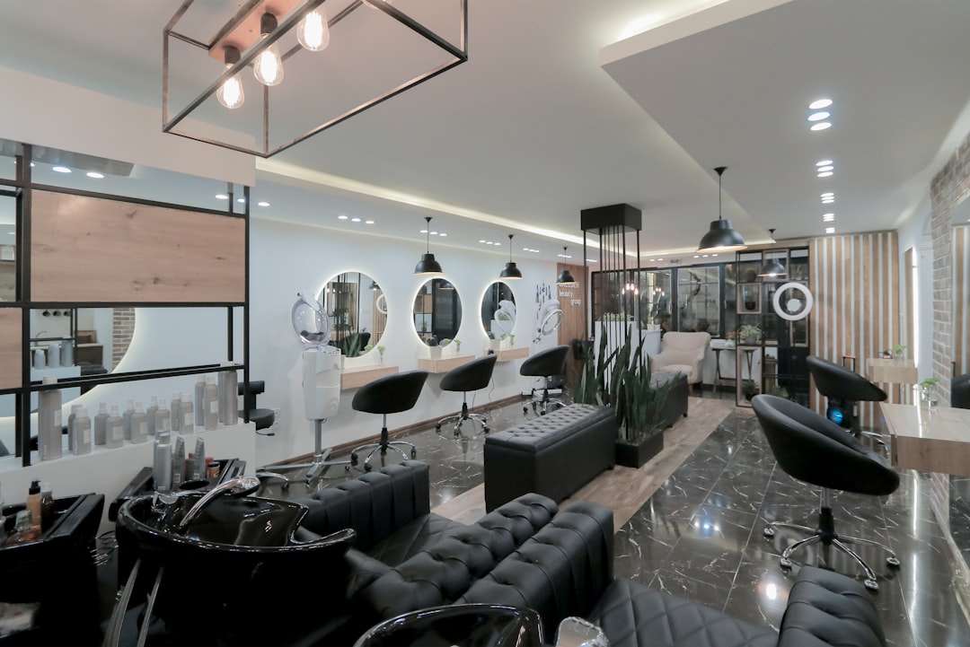 a-room-filled-with-furniture-and-a-large-window-c-s7lqxhpw